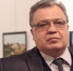 За мгновения до гибели. Убийца стоит позади посла Андрея Карлова. Спокадр видеозаписи Youtube - SkNews.Ru