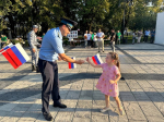 Сотрудники УФССП России по Республике Адыгея поздравили жителей с Днем Государственного флага Российской Федерации
